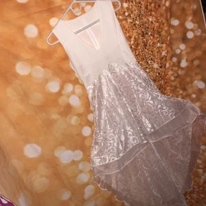 Woman’s high low silk, and lace dress